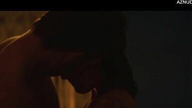 Wild kisses between Margot Robbie and a black man