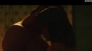 Wild kisses between Margot Robbie and a black man