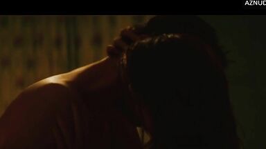 Wild kisses between Margot Robbie and a black man