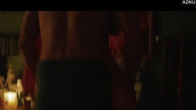 Wild kisses between Margot Robbie and a black man