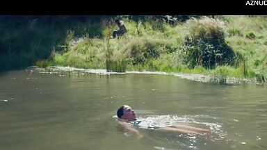 Wild kisses between Margot Robbie and a black man