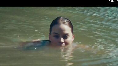 Wild kisses between Margot Robbie and a black man