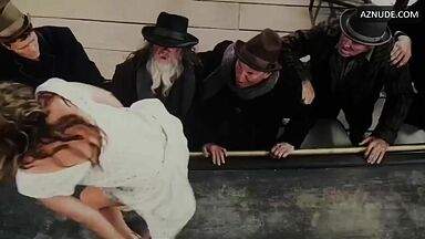 Margot shows us her left tits