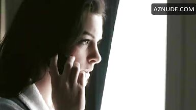 Anne Hathaway in bathrobe and underwear