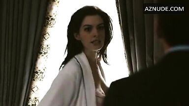 Anne Hathaway in bathrobe and underwear