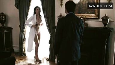 Anne Hathaway in bathrobe and underwear