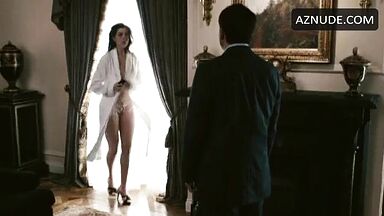 Anne Hathaway in bathrobe and underwear