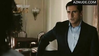 Anne Hathaway in bathrobe and underwear