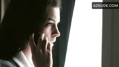 Anne Hathaway in bathrobe and underwear