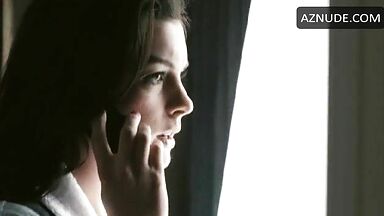 Anne Hathaway in bathrobe and underwear