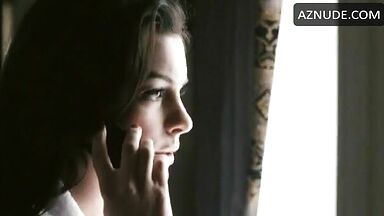 Anne Hathaway in bathrobe and underwear