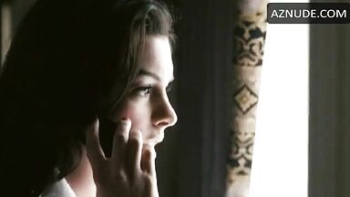 Anne Hathaway in bathrobe and underwear