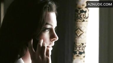 Anne Hathaway in bathrobe and underwear