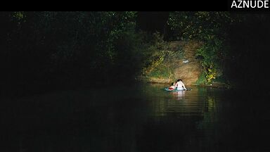 Margot Robbie caught swimming in the lake