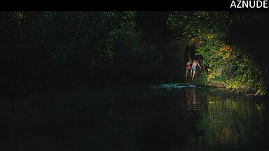 Margot Robbie caught swimming in the lake