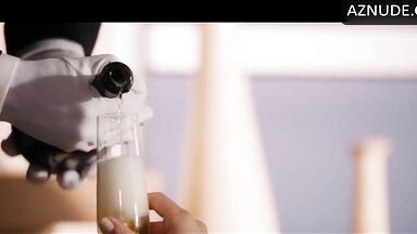 Blonde in a bathtub full of foam