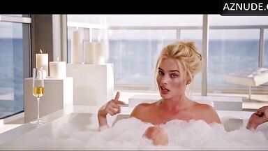 Blonde in a bathtub full of foam