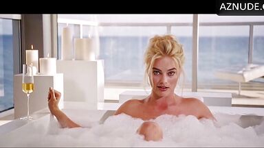 Blonde in a bathtub full of foam