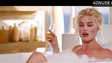 Blonde in a bathtub full of foam