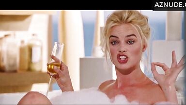 Blonde in a bathtub full of foam