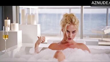 Blonde in a bathtub full of foam