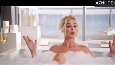 Blonde in a bathtub full of foam