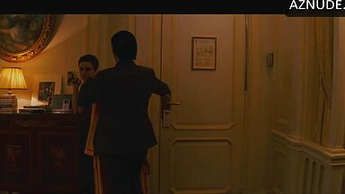 Anne Hathaway naked in a hotel room