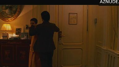 Anne Hathaway naked in a hotel room