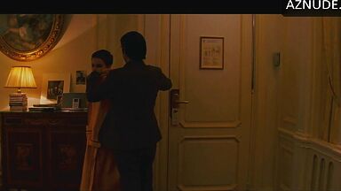 Anne Hathaway naked in a hotel room