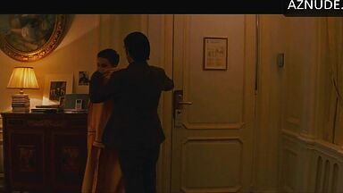 Anne Hathaway naked in a hotel room