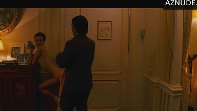 Anne Hathaway naked in a hotel room