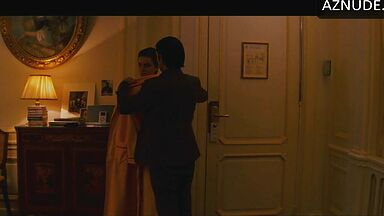 Anne Hathaway naked in a hotel room