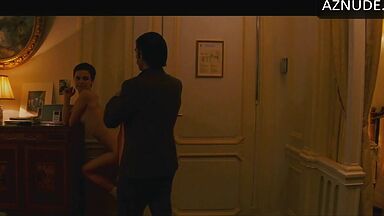 Anne Hathaway naked in a hotel room