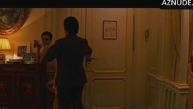 Anne Hathaway naked in a hotel room