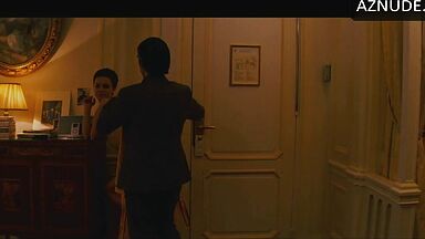 Anne Hathaway naked in a hotel room