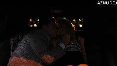 Handling Margot's breasts