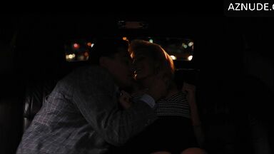 Handling Margot's breasts