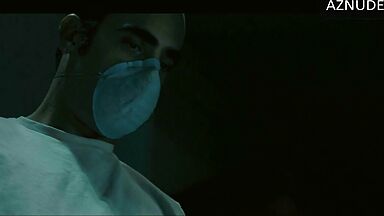 In underwear with the duvet on her