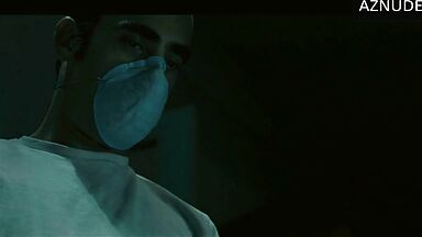 In underwear with the duvet on her