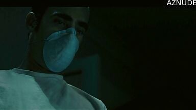 In underwear with the duvet on her