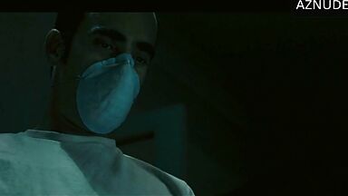 In underwear with the duvet on her