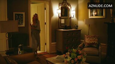 Margot Robbie undoing her sexy hair in front of the mirror