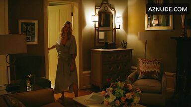 Margot Robbie undoing her sexy hair in front of the mirror