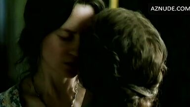 Passionate kiss between two women