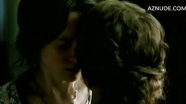 Passionate kiss between two women