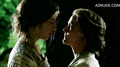 Passionate kiss between two women