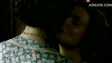 Passionate kiss between two women