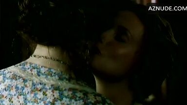 Passionate kiss between two women