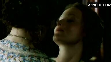 Passionate kiss between two women