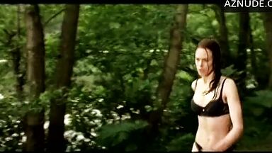 She runs through the forest in her underwear